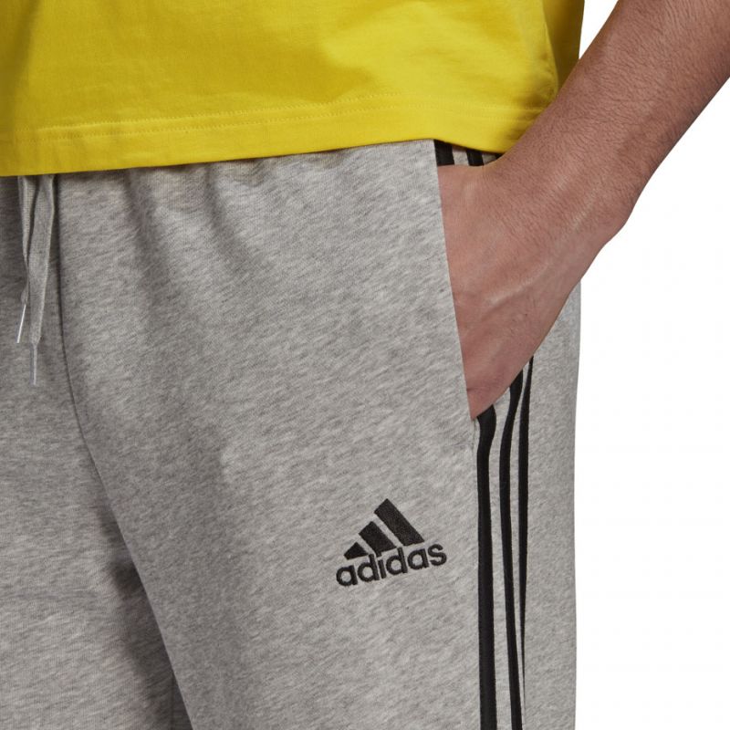 Hlače Adidas Essentials Tapered Cuff 3 Stripes M GK8889