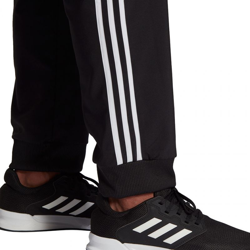 Hlače adidas Essentials Tapered Cuff 3 Stripes M GK8980