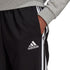 Hlače adidas Essentials Tapered Cuff 3 Stripes M GK8980